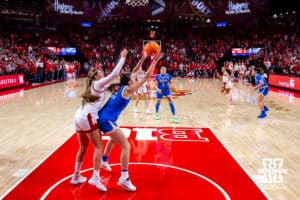 UCLA Bruin forward Gabriela Jaquez (11) grabs the rebound against Nebraska Cornhusker forward Petra Bozan (4) in the first quarter during a college women’s basketball game on Sunday, Jan. 11, 2026, in Lincoln, Nebraska. Photo by John S. Peterson.