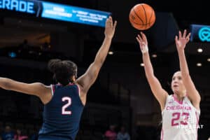 Creighton Bluejay Neleigh Gessert (23) shoots a three pointer during a college basketball game against UCONN on Jan 11, 2026 in Omaha, Nebraska. Photo by Brandon Tiedemann