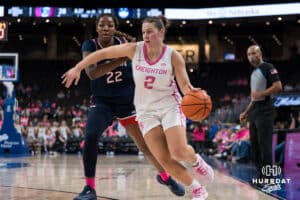 Creighton Bluejay Kennedy Townsend (2) looks to drive baseline past Serah Williams (22) during a college basketball game against UCONN on Jan 11, 2026 in Omaha, Nebraska. Photo by Brandon Tiedemann