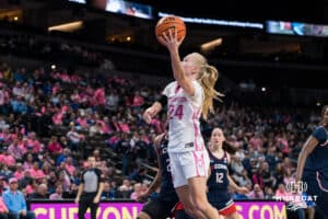 Creighton Bluejay Ava Zediker (24) shoots a lay up during a college basketball game against UCONN on Jan 11, 2026 in Omaha, Nebraska. Photo by Brandon Tiedemann