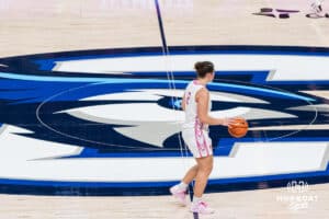 Creighton Bluejay Kennedy Townsend (2) takes the ball past half court during a college basketball game against UCONN on Jan 11, 2026 in Omaha, Nebraska. Photo by Brandon Tiedemann