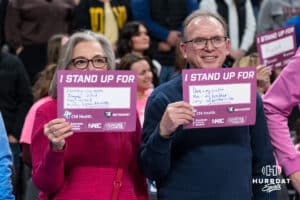 Creighton Bluejay fans hold up their Pink Out signs during a college basketball game against UCONN on Jan 11, 2026 in Omaha, Nebraska. Photo by Brandon Tiedemann