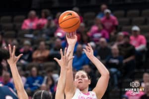 Creighton Bluejay Kennedy Townsend (2) shoots a three pointer over Azzi Fudd (35) during a college basketball game against UCONN on Jan 11, 2026 in Omaha, Nebraska. Photo by Brandon Tiedemann