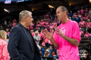 Creighton Bluejay head coach Jim Flanery and UCONN head coach Geno Auriemma talk before the college basketball game on Jan 11, 2026 in Omaha, Nebraska. Photo by Brandon Tiedemann