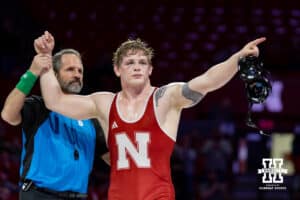 At 197: #12 Nebraska Cornhusker Camden McDanel celebrates the win over #23 Purdue Boilermaker Ben Vanadia, McDanel wins 7-1 during a college wrestling match on Friday, Jan. 9, 2026, in Lincoln, Nebraska. Photo by John S. Peterson.
