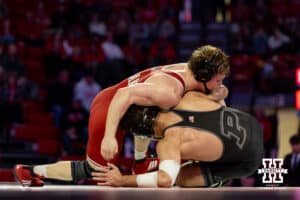At 197: #12 Nebraska Cornhusker Camden McDanel work over #23 Purdue Boilermaker Ben Vanadia, McDanel win 7-1 during a college wrestling match on Friday, Jan. 9, 2026, in Lincoln, Nebraska. Photo by John S. Peterson.