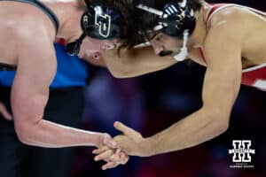 At 184: #9 Nebraska Cornhusker Silas Allred fights the grip by #25 Purdue Boilermaker James Rowley, Allred wins by decision 4-1 during a college wrestling match on Friday, Jan. 9, 2026, in Lincoln, Nebraska. Photo by John S. Peterson.