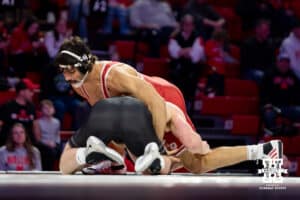 At 184: #9 Nebraska Cornhusker Silas Allred working on #25 Purdue Boilermaker James Rowley, Allred wins by decision during a college wrestling match on Friday, Jan. 9, 2026, in Lincoln, Nebraska. Photo by John S. Peterson.