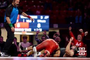 At 174: #6 Nebraska Cornhusker Christopher Minto takes down #16 Purdue Boilermaker Brody Baumann in the last seconds, Minto wins by decision 11-8 during a college wrestling match on Friday, Jan. 9, 2026, in Lincoln, Nebraska. Photo by John S. Peterson.