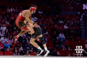 At 174: #16 Purdue Boilermaker Brody Baumann picks up #6 Nebraska Cornhusker Christopher Minto, Minto wins by decision 11-8 during a college wrestling match on Friday, Jan. 9, 2026, in Lincoln, Nebraska. Photo by John S. Peterson.