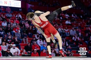 At 165: #8 Nebraska Cornhuskers LJ Araujo tries to throw #4 Purdue Boilermakers Joey Blaze, Blaze wins by decision 8-2 during a college wrestling match on Friday, Jan. 9, 2026, in Lincoln, Nebraska. Photo by John S. Peterson.