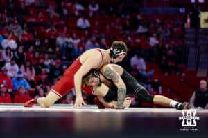At 165: #4 Purdue Boilermakers Joey Blaze gets the leg against #8 Nebraska Cornhuskers LJ Araujo, Blaze wins by decision 8-2 during a college wrestling match on Friday, Jan. 9, 2026, in Lincoln, Nebraska. Photo by John S. Peterson.