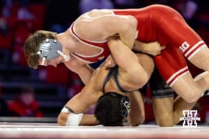 At 149: #11 Nebraska Cornhusker Chance Lamer works the arms against #21 Purdue Boilermaker Gavin Brown, Lamer wins by major decision, 12-2 during a college wrestling match on Friday, Jan. 9, 2026, in Lincoln, Nebraska. Photo by John S. Peterson.