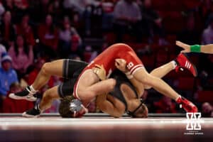 At 149: #11 Nebraska Cornhusker Chance Lamer tries to get #21 Purdue Boilermakers Gavin Brown on his back, Lamer wins by major decision, 12-2 during a college wrestling match on Friday, Jan. 9, 2026, in Lincoln, Nebraska. Photo by John S. Peterson.