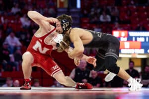 At 133: #8 Nebraska Cornhusker Jacob Van Dee defends against an attack by Blake Boarman, Van Dee wins by major decision 13-2 during a college wrestling match on Friday, Jan. 9, 2026, in Lincoln, Nebraska. Photo by John S. Peterson.