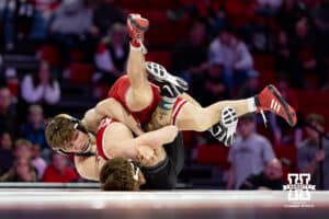 At 125: Nebraska Cornhusker Alan Koehler fights Purdue Boilermaker Ashton Jackson, Koekler wins by decision 9-3 during a college wrestling match on Friday, Jan. 9, 2026, in Lincoln, Nebraska. Photo by John S. Peterson.