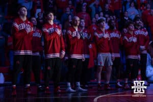 Nebraska Cornhuskers standing at attention for the National Anthem being performed before taking on the Purdue Boilermakers during a college wrestling match on Friday, Jan. 9, 2026, in Lincoln, Nebraska. Photo by John S. Peterson.