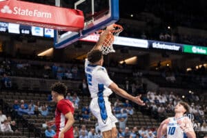 Creighton Bluejay Shane Thomas (12) dunks during a college basketball game against St. John’s on Jan 10, 2026 in Omaha, Nebraska. Photo by Brandon Tiedemann