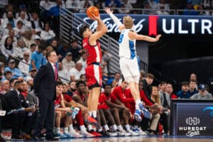 Creighton Bluejay Ty Davis (9) attempts to block Lefteris Liotopoulos (31) shot during a college basketball game against St. John’s on Jan 10, 2026 in Omaha, Nebraska. Photo by Brandon Tiedemann