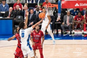Creighton Bluejay Jasen Green (0) shoots a lay up past Zuby Ejiofor (24) during a college basketball game against St. John’s on Jan 10, 2026 in Omaha, Nebraska. Photo by Brandon Tiedemann