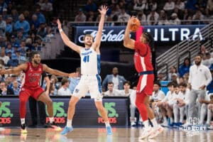 Creighton Bluejay Isaac Traudt (41) contests Bryce Hopkins (23) three pointer during a college basketball game against St. John’s on Jan 10, 2026 in Omaha, Nebraska. Photo by Brandon Tiedemann