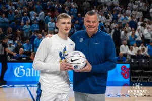 Creighton Bluejay Josh Dix (4) and head coach Greg McDermott pose together after Josh Dix (4) surpassed 1,000 career points before a college basketball game against St. John’s on Jan 10, 2026 in Omaha, Nebraska. Photo by Brandon Tiedemann