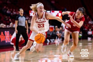 Nebraska Cornhusker guard Britt Prince (23) drives to the basket against Indiana Hoosier guard Nevaeh Caffey (2) during a college women’s basketball game on Thursday, Jan. 8, 2026, in Lincoln, Nebraska. Photo by John S. Peterson.