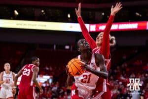 Nebraska Cornhusker forward Eliza Maupin (21) makes a lay up against Indiana Hoosier guard Lenée Beaumont (5) during a college women’s basketball game on Thursday, Jan. 8, 2026, in Lincoln, Nebraska. Photo by John S. Peterson.