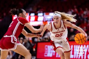 Nebraska Cornhusker guard Britt Prince (23) drives to the basket against Indiana Hoosier guard Nevaeh Caffey (2) during a college women’s basketball game on Thursday, Jan. 8, 2026, in Lincoln, Nebraska. Photo by John S. Peterson.