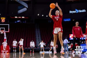 Nebraska Cornhusker guard Callin Hake (14) make a jump shot warming up to take on the Indiana Hoosiers during a college women’s basketball game on Thursday, Jan. 8, 2026, in Lincoln, Nebraska. Photo by John S. Peterson.