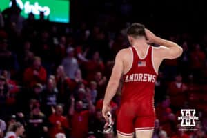 At HWT, Nebraska Cornhusker Harley Andrews celebrates the win over Northern Iowa Panther Adam Ahrendsen during a college wrestling match. Andrews won by major decision against Ahrendsen 16-7 on Saturday, Jan. 3, 2026, in Lincoln, Nebraska. Photo by John S. Peterson.