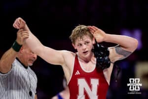 At 197, #12 Nebraska's Camden McDanel celebrates his win over Northern Iowa's John Gunderson during a college wrestling match on Saturday, Jan. 3, 2026, in Lincoln, Nebraska. McDanel wins by decision 7-3. Photo by John S. Peterson.