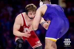 At 197, #12 Nebraska's Camden McDanel looks for an opening for a takedown against Northern Iowa's John Gunderson during a college wrestling match on Saturday, Jan. 3, 2026, in Lincoln, Nebraska. McDanel wins by decision 7-3. Photo by John S. Peterson.