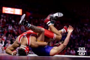At 174, No. 6 Nebraska Cornhusker Chris Minto has No. 10 Northrern Iowa Panther Jared Simma on his back during a college wrestling match. Minto wins by major decision over Simma on Saturday, Jan. 3, 2026, in Lincoln, Nebraska. Minto wins be Major desicionxc Photo by John S. Peterson.