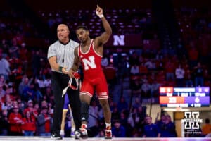 At 157, #5 Nebraska's Antrell Taylor celebrates his win over Northern Iowa's RJ Weston during a college wrestling match on Saturday, Jan. 3, 2026, in Lincoln, Nebraska. Taylor wins by technical fall 22-6. Photo by John S. Peterson.