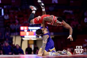 At 157, #5 Nebraska's Antrell Taylor gets thrown by Northern Iowa's RJ Weston during a college wrestling match on Saturday, Jan. 3, 2026, in Lincoln, Nebraska. Taylor wins by technical fall 22-6. Photo by John S. Peterson.