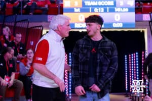 Nebraska Cornhusker head coach Markk Manning talks to former Nebraska wrestler and National Champion Ridge Lovett during a college wrestling match against Northern Iowa on Saturday, Jan. 3, 2026, in Lincoln, Nebraska. Photo by John S. Peterson.