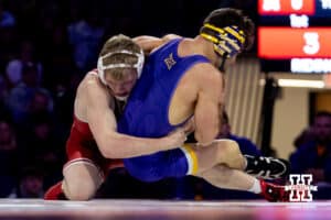 At 133, #8 Nebraska Cornhusker Jacob Van Dee takes on #26 Julian Farber, 5-0, during a college wrestling match on Saturday, Jan. 3, 2026, in Lincoln, Nebraska. Photo by John S. Peterson.