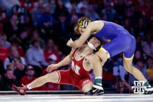 At 125, Nebraska Cornhusker Alan Koehler shoots for a leg against #27 Northern Iowa Panther Trever Anderson during a college wrestling match. Koehler won by decision over Anderson 5-2 on Saturday, Jan. 3, 2026, in Lincoln, Nebraska. Photo by John S. Peterson.