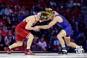 At 125, no. 27 Nebraska Cornhusker Trever Anderson locks up with Northern Iowa Panther Alan Koehler during a college wrestling match. Koehler won by decision over Anderson 5-2 on Saturday, Jan. 3, 2026, in Lincoln, Nebraska. Photo by John S. Peterson.