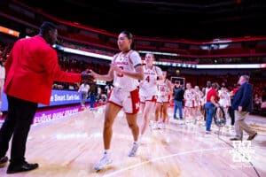 Nebraska Cornhusker forward Amiah Hargrove (33) gives assistant coach Julian Assibey five heading back to the lockerroom after the win over the Purdue Boilermakers during a college women’s basketball game on Sunday, Jan. 4, 2026, in Lincoln, Nebraska. Photo by John S. Peterson.