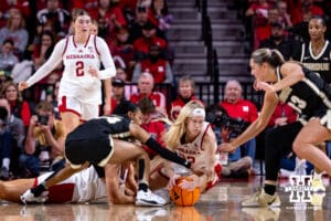 Nebraska Cornhusker guard Britt Prince (23) dives for the ball against the Purdue Boilermakers during a college women’s basketball game on Sunday, Jan. 4, 2026, in Lincoln, Nebraska. Photo by John S. Peterson.