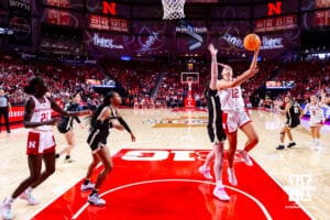 Nebraska Cornhusker forward Jessica Petrie (12) makes a lay up against Purdue Boilermaker forward Lana McCarthy (35) during a college women’s basketball game on Sunday, Jan. 4, 2026, in Lincoln, Nebraska. Photo by John S. Peterson.