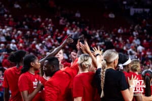 Nebraska Cornhuskers huddle up before going into the locker room after warm-up against the Purdue Boilermakers during a college women’s basketball game on Sunday, Jan. 4, 2026, in Lincoln, Nebraska. Photo by John S. Peterson.