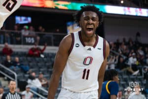 Omaha Maverick Paul Djobet (11) celebrates a dunk during a basketball game against Kansas City on Saturday, Jan 3, 2026, in Omaha, Nebraska. Photo by Brandon Tiedemann.