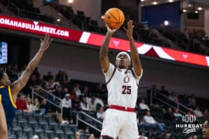 Omaha Maverick Khamani Cooper (25) shoots a jump shot during a basketball game against Kansas City on Saturday, Jan 3, 2026, in Omaha, Nebraska. Photo by Brandon Tiedemann.