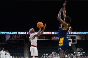 Omaha Maverick Khamani Cooper (25) attempts a three pointer during a basketball game against Kansas City on Saturday, Jan 3, 2026, in Omaha, Nebraska. Photo by Brandon Tiedemann.