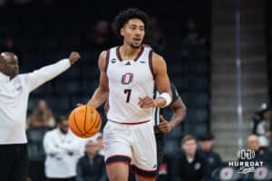 Omaha Maverick Lance Waddles (7) dribbles the ball up court during a basketball game against Kansas City on Saturday, Jan 3, 2026, in Omaha, Nebraska. Photo by Brandon Tiedemann.