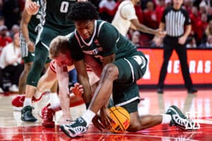 Nebraska Cornhusker forward Rienk Mast (51) goes after a loose ball against Michigan State Spartan forward Cameron Ward (3) in the first half during a college basketball game on Friday, Jan. 2, 2026, in Lincoln, Nebraska. Photo by John S. Peterson.