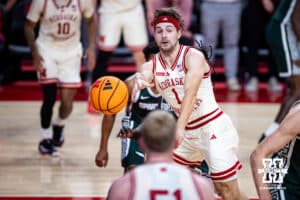 Nebraska Cornhusker guard Sam Hoiberg (1) makes a pass to Rienk Mast for a three-point shot against the Michigan State Spartans in the first half during a college basketball game on Friday, Jan. 2, 2026, in Lincoln, Nebraska. Photo by John S. Peterson.